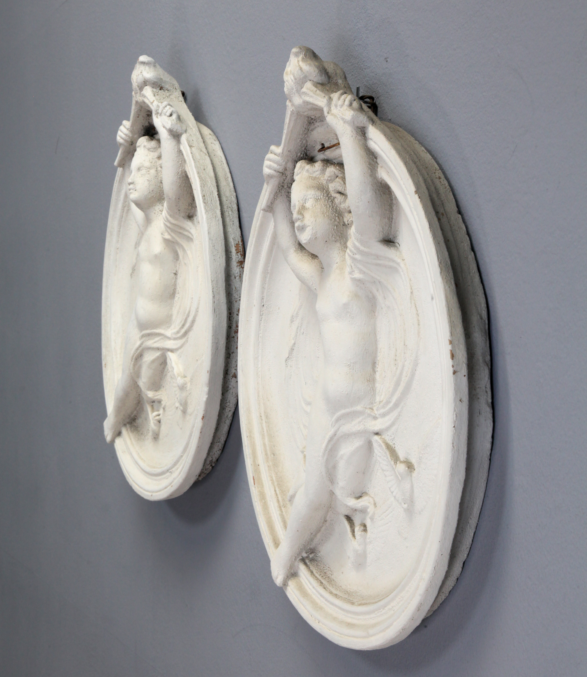 2 Terrakotta Reliefs mit Engel, sign. P. Vogel, datiert 1892